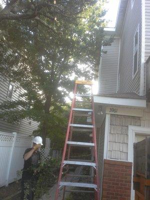 Clearing a roof on W. Stratford Rd. Va. Beach