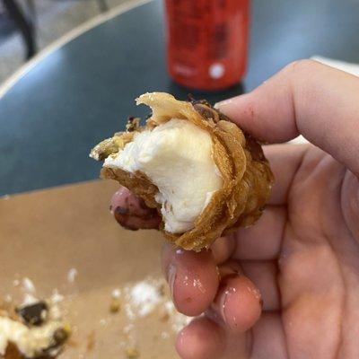 Look how perfect this cannoli shell is: it's not thick at all. Fresh and crispy! The texture and the flavor of the filling - authentic!