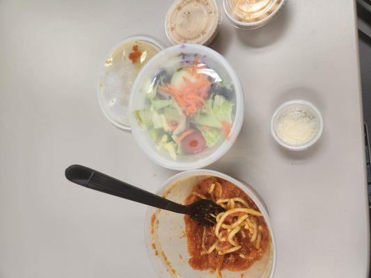 Lunch special,  spaghetti with marinara sauce and side salad.