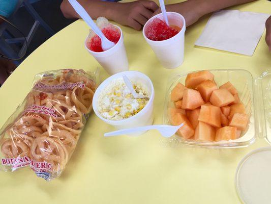 Corn in a cup, chicarones, water melon, snow cones