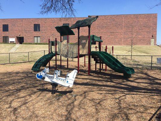 Nice playground equipment, minimal spots for little ones to fall down. My 22mo had no problems climbing this solo.