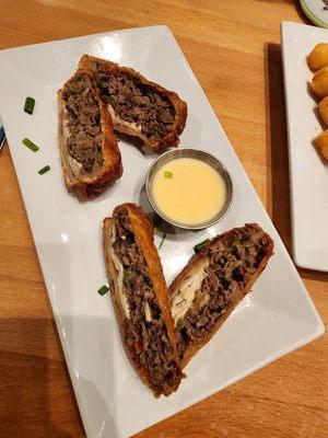 Philly cheesesteak egg rolls. Meh...I've had way better.