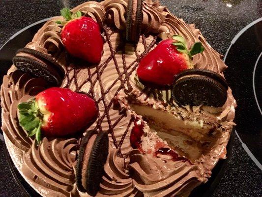 Tres leche cake w/ chocolate whipped topping (strawberries & chocolate Oreos). Whoops! Forgot to take the photo before cutting.