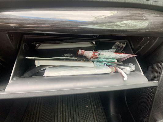 Items crammed back in to the glove box anyway, they would fit and a multi tool left on the floor