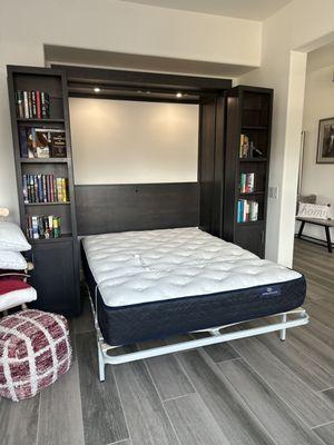 Wallbed bookcase with bed down