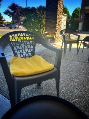 Outdoor seating in the afternoon shade.