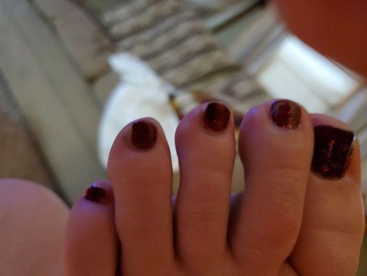 Half painted toes from my $45 deluxe pedi at Queen Nails. Place is a ripoff