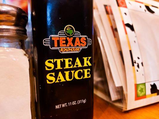 Steak sauce on table