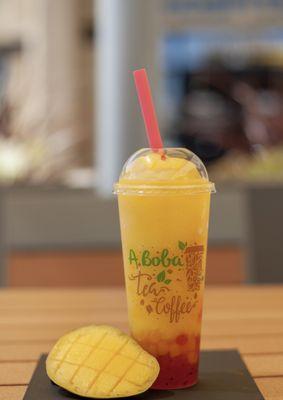 Mango slushie with crystal mango and dragon fruit boba