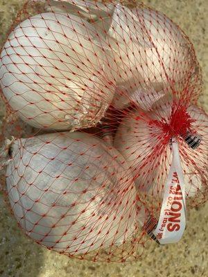 Two pounds white onions. 99 cents.