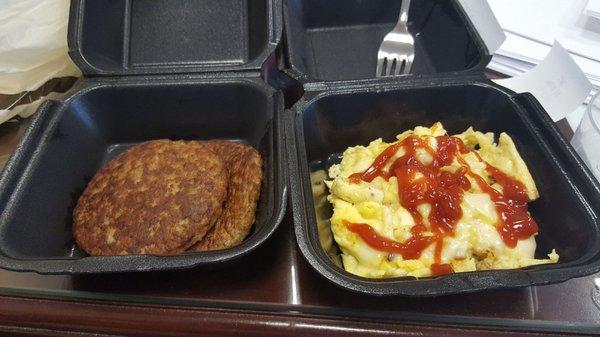 Side of sausage with a side of scrambled eggs with American cheese.....i added the ketchup