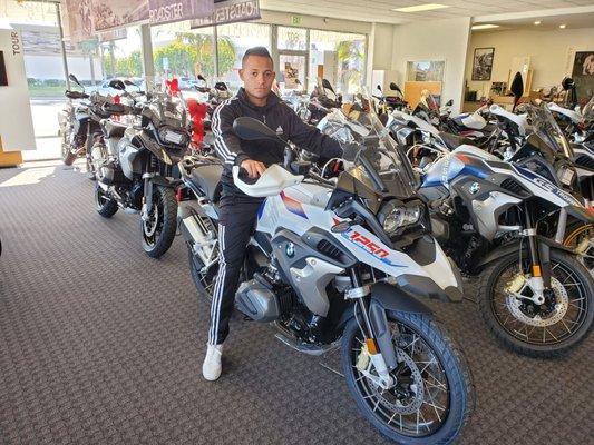 My friend checking out the bikes they had on display before someone arrogantly comes and makes a comment about it.