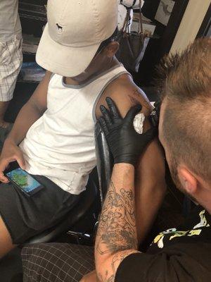 Juju gets his first tat. Thanks Keith.