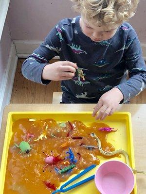 Dinosaur goo for sensory play and fine motor development