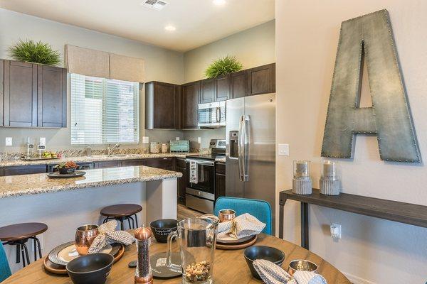 Avilla Victoria homes in Queen Creek, AZ - Dining Room and Kitchen