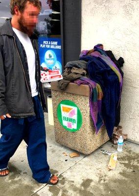 A typical day at the entrance of the 7-11 on Sandrock Rd.