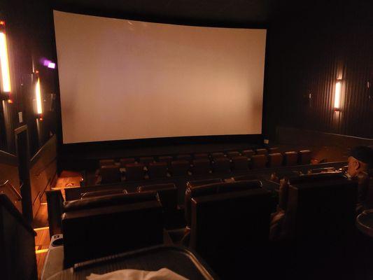 Nice lounge chairs. Great theater sound. Looks empty but I am early as usual