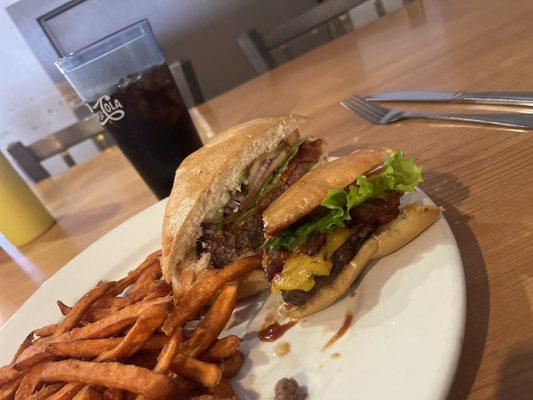 BBQ Sauce, Bacon and Cheddar Burger with Sweet Potato Fries - cut in half