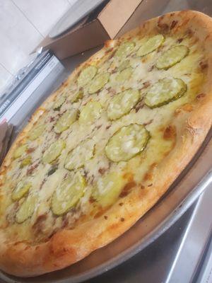 Famous pickle pizza with bacon