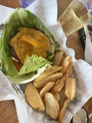 Burger with cheese and lettuce instead of bread