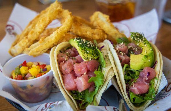 Ahi tuna tacos with onion rings.