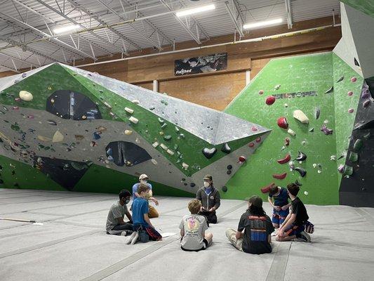 Scouts getting their rock climbing merit badge with Edgeworks staff.