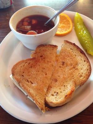 Grilled cheese sandwich and vegetable beef soup.