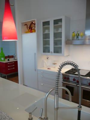 Raised bar top is Carrara River Rock Embedded in Clear Resin.