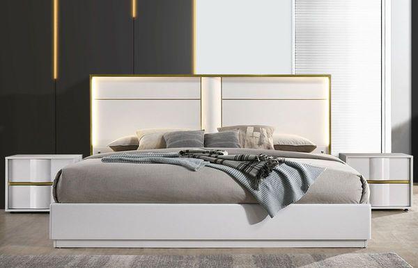 modern platform bed with lights and gold finish accents in white lacquer finish