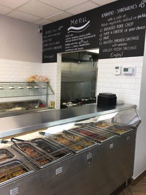 Hot food counter where you can order delicious freshly made pierogi, salads and sandwiches.