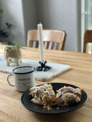 Almond croissant and coffee enjoyed at home