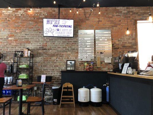 Old Drum Coffeehouse & Eatery front counter, menu, merchandise shelves