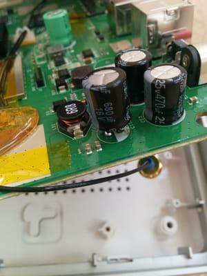 The replaced capacitor on the router.