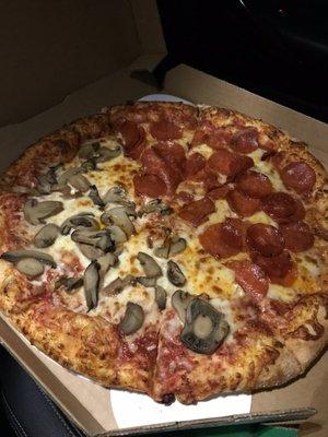 Large pizza: half pepperoni half mushroom