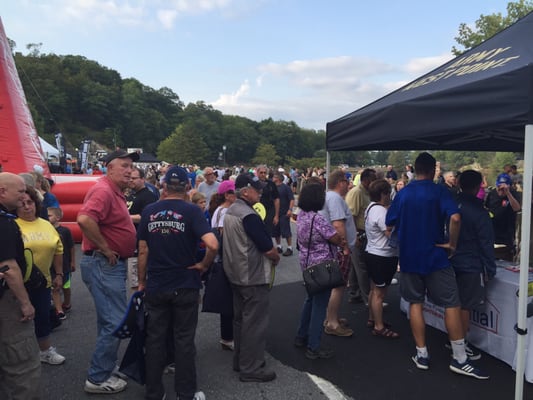 Residential Home Funding amidst a crowd of West Point Football fans.