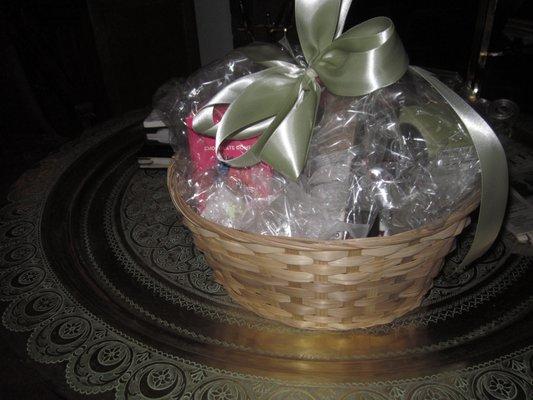 Gift basket--rewrapped after opening but filled with chocolates, fresh fruit and goodies March 2022!