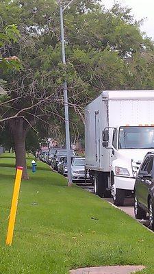 From stop sign to stop sign on Lynbrook... 26 vehicles and a panel truck.