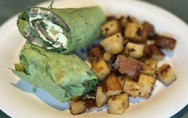 Egg white with avocado, onion and mushroom wrap with home fries