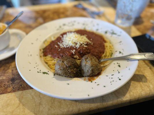 Angel hair pasta with meatballs and tomato basil sauce