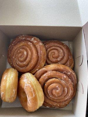 Cinnamon roll and glazed doughnuts