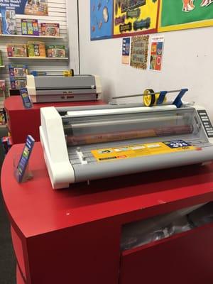 Laminating machines. Teacher Club 39 cents a foot; non-teacher club 49 cents a foot.