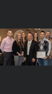 The Eisenhauer Team with Gino Blefari, Chairman of HSF at Berkshire Hathaway HomeServices NW Real Estate awards banquet February 2020