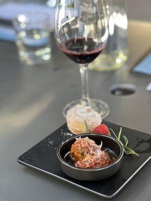 Tasting with meatball and bomboloni (donut)