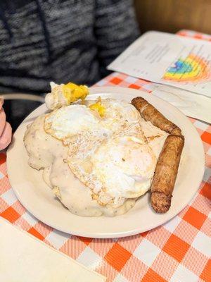 Biscuits and gravy with eggs and sausage