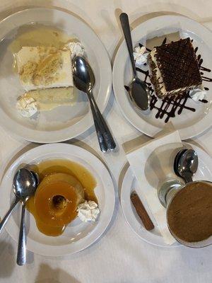 Clockwise: Tres leches(top left) , tiramisu, rice pudding, flan