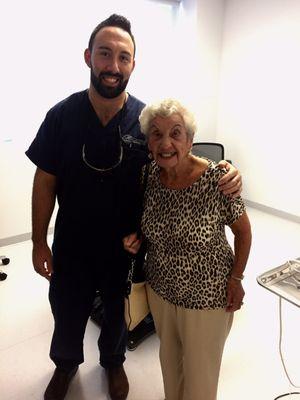 Dr. Paonessa and my grandmother smiling ear to ear after her surgery.