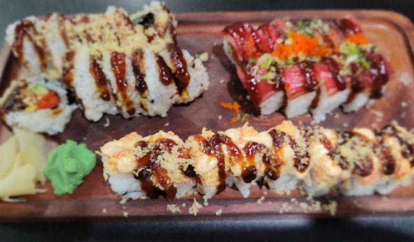 Clockwise from top left: Spiderman Maki, Dancing Tuna Maki, and Spicy Tuna Deluxe Maki