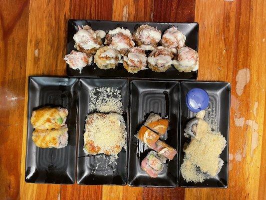 On top - Crazy Rich Roll Left to right - Snow Corn Roll - Japanese Lasagna Roll - Lemon Roll - BTS Roll