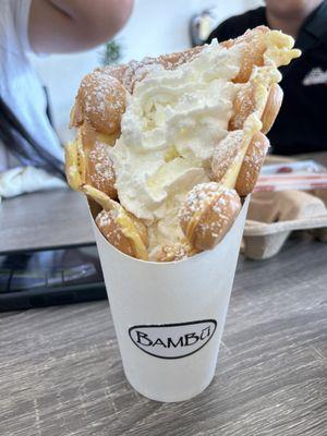 My daughter got the bubble waffle (regular with just powdered sugar and whipped cream).