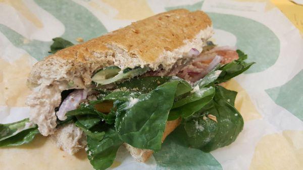 Tuna on wheat with some extras. Couldnt wait to take a pic. Had to take a bite when i opened it. Had my hangry going on.